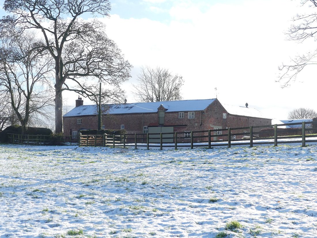 The stable block at Chorlton Hall in winter