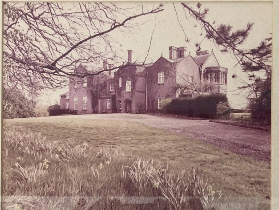 Photograph of Chorlton Hall used during the 1970 sale, captioned Chorlton Hall Malpas, Sold by Denton Clark and Co 1970, showing the entrance front with daffodils in the foreground