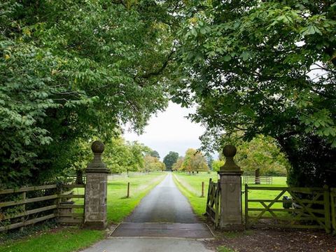 The gated entrance to the drive at Chorlton Hall